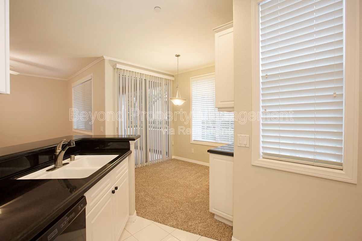 ***2 BED 2 BATH CONDO***PET-FRIENDLY***DETACHED GARAGE***FIREPLACE***GROUND FLOOR UNIT*** property image