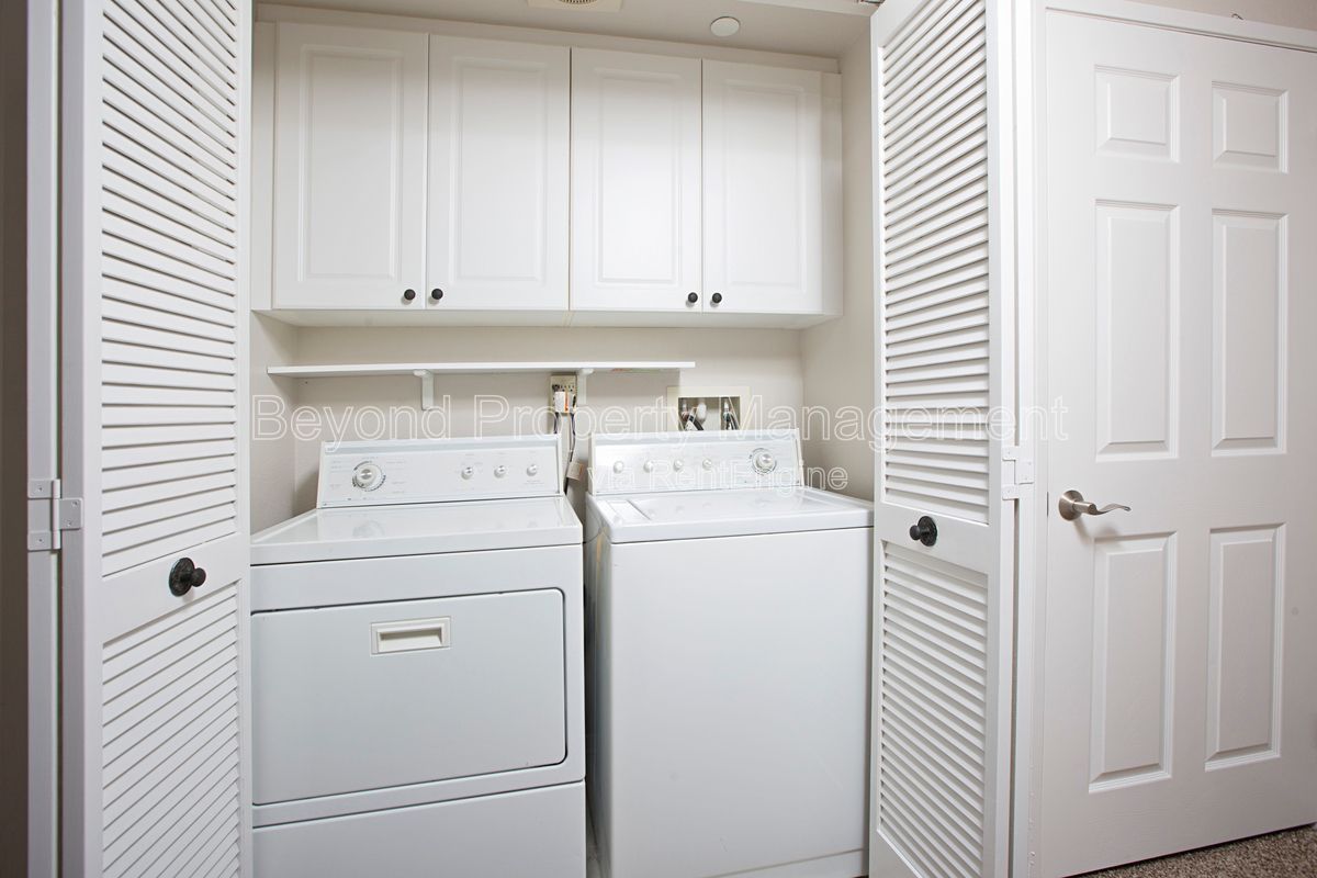 ***2 BED 2 BATH CONDO***PET-FRIENDLY***DETACHED GARAGE***FIREPLACE***GROUND FLOOR UNIT*** property image