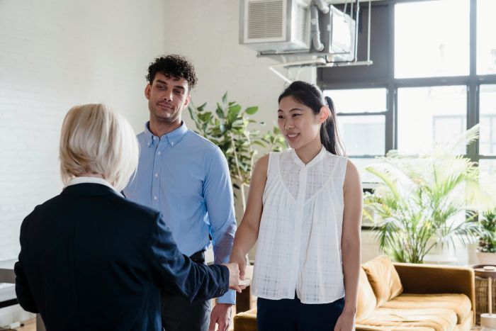 Property manager meeting with prospective tenants
